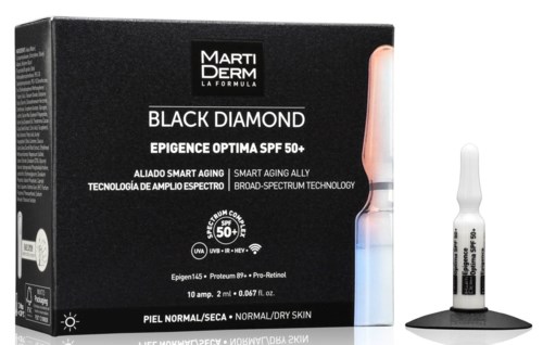 En box med en liten ampullflaska framför, reklam för en hudvårdsprodukt med SPF 50 för normal/torr hy.