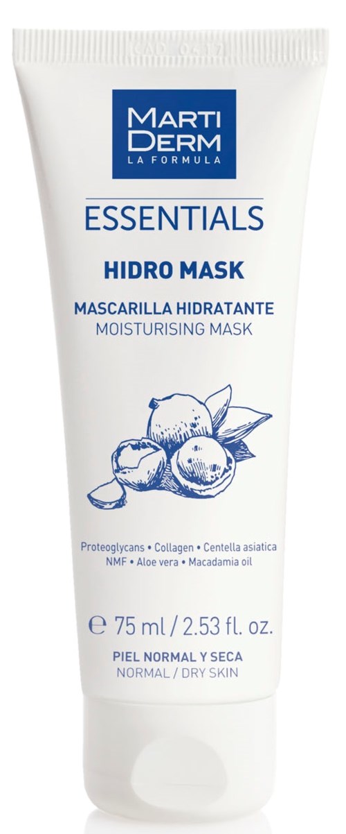 En vit tub med fuktgivande ansiktsmask med blå och svart text, och en teckning av frukter, för torr hud.