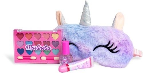 Färgglad enhörningsgosedjur med stängda ögon, horn och öron, tillsammans med en rosa ögonskuggspalett, nagellack och läppglans.