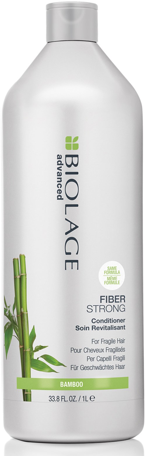 En vit flaska av Biolage Advanced fiber strong balsam med bambuillustration och gröna detaljer.