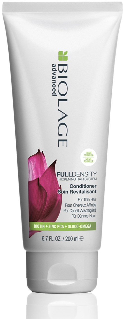 En hvid tube med Biolage advanced Full Density balsam med lilla blomsterdesign og grøn og lilla tekst.