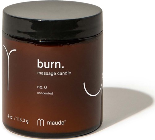 A brown jar labeled 'burn. massage candle, no.0, unscented.' with a black lid, casting a shadow.