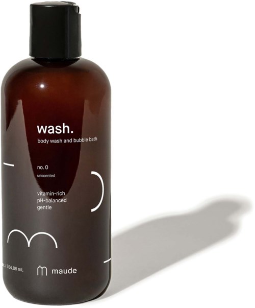 A brown bottle labeled 'wash' with black cap, designed for body wash and bubble bath, with simple white text and minimal graphics.