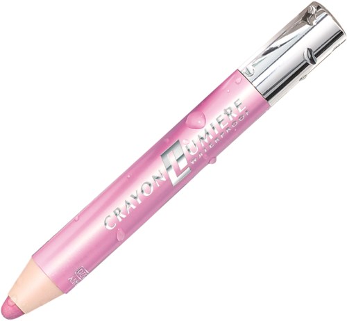 Pinkki voide, jossa on hopeinen pää ja teksti 'CRAYON LUMIÈRE'.