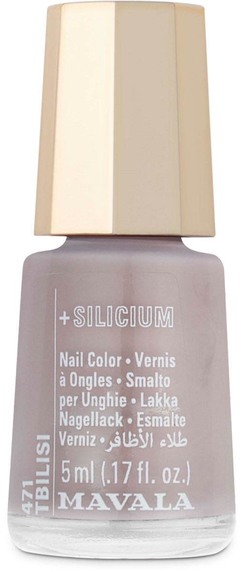 Ein Nagellackflasche mit beigem Deckel und lila Lack, beschriftet 'SILICIUM' und 'MAVALA.'