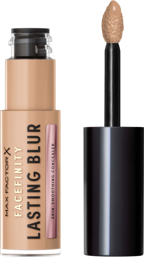 Peitevoide, jossa beige kansi ja musta/applicator, merkitty ihon tasoitukseen ja kestäväksi peitoksi.
