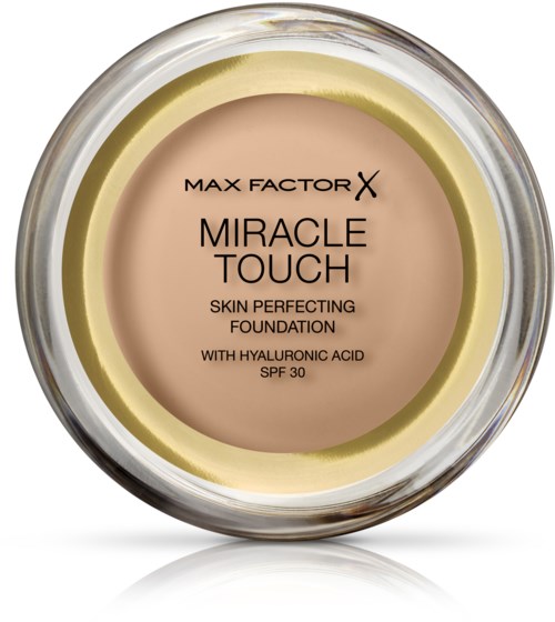 Et glass med foundation merket 'Max Factor X Miracle Touch' som lover hudforbedring og SPF 30.