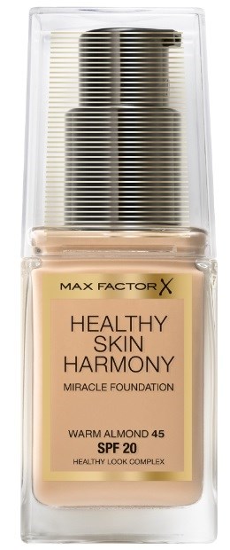 En flaske foundation merket 'Max Factor X Healthy Skin Harmony' med SPF 20, varm mandel skygge, i gjennomsiktig emballasje.