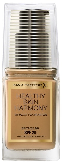 En foundationflaske merket 'MAX FACTOR X', som fremmer sunn hud med SPF 20, i en klar beholder.