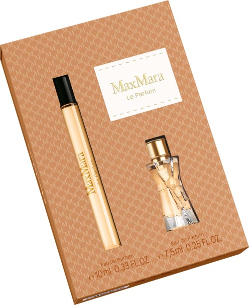 MaxMara Le Parfum parfumesæt med en flaske og en rullepen på et mønstret brunt baggrund.