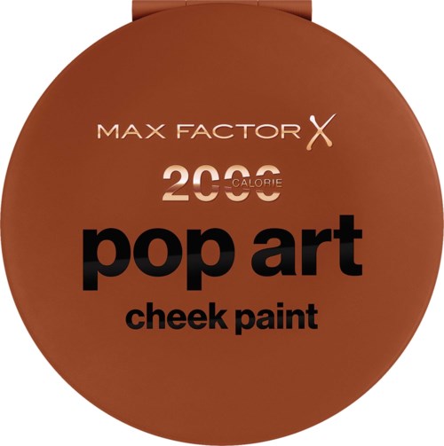 En rund beholder med brun farge og svart tekst, merket Max Factor pop art kinnfarge, 200 kalorier.