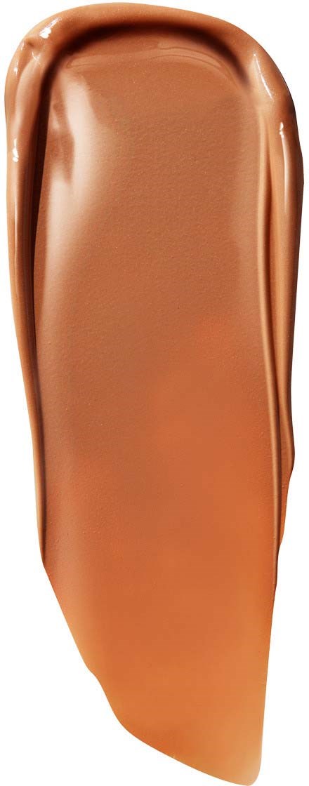 En lang, jevn prøve av brun / beige makeup eller kosmetikk på en hvit bakgrunn.