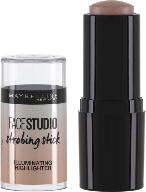 A Maybelline Face Studio strobing stick with a beige shade. It is shown outside its transparent plastic case.