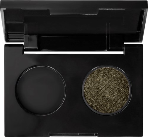 Een make-up palette met twee cirkels: een leeg en een gevuld met bruin oogschaduw of pigment.