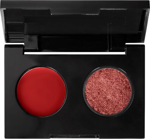 Een make-up palette met twee ronde kommen: één bevat vaste rode kleur, de andere heeft glanzende pigment.