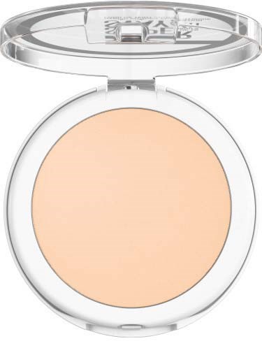 En kompakt puddermakeup med gjennomsiktig lokk som viser det beige pulveret inni.