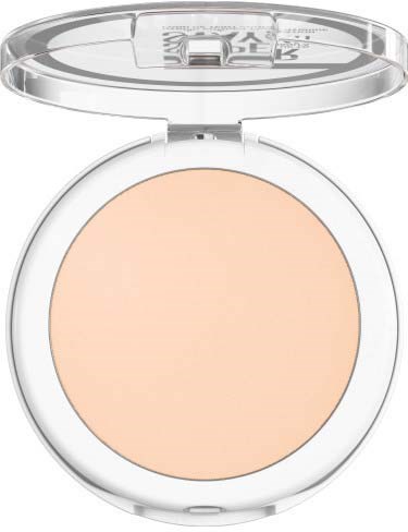 En kompakt sminkförpackning med ljusbeige puder inuti och ett klart lock. Locken är öppet.
