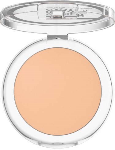 En kompakt makeuppuder i ett vitt fodral med ett genomskinligt lock. Pudret är ljusbeige.
