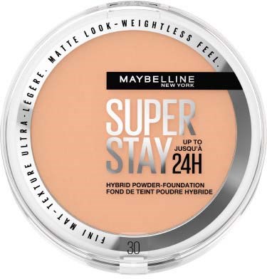 En Maybelline New York-kompaktfoundation med rund form, beige färg och svarta och vita textetiketter.