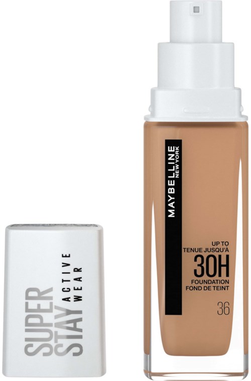 Butelka podkładu Maybelline z pompką obok białej pokrywki oznaczonej Super Stay. Podkład na maksa 30 godzin.