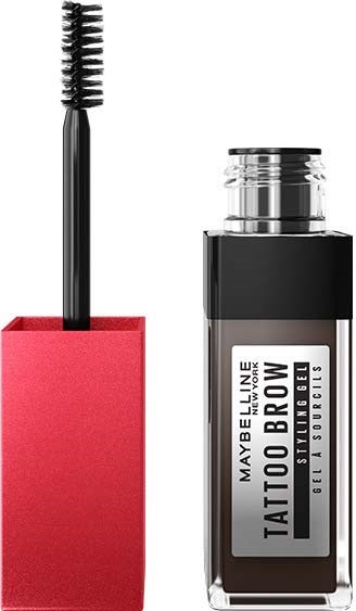 Pojemnik na tusz do rzęs z szczoteczką i włosiem, oznaczony "Maybelline Tattoo Brow Gel" w czerni i bieli.