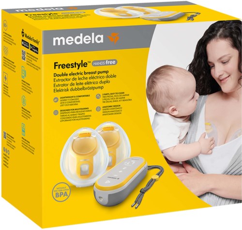A woman breastfeeds a baby, with a yellow and white breast pump package in the foreground.