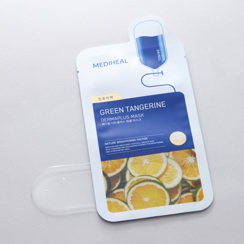 A face mask packaging with lemon images and blue text, featuring a peel-off tab at the top.