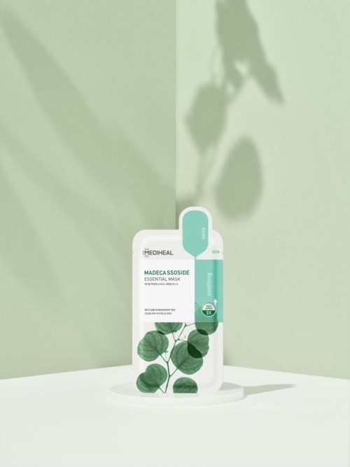 A package of Mediheal mask with green leaves and a light green background. It appears to be a skincare product.