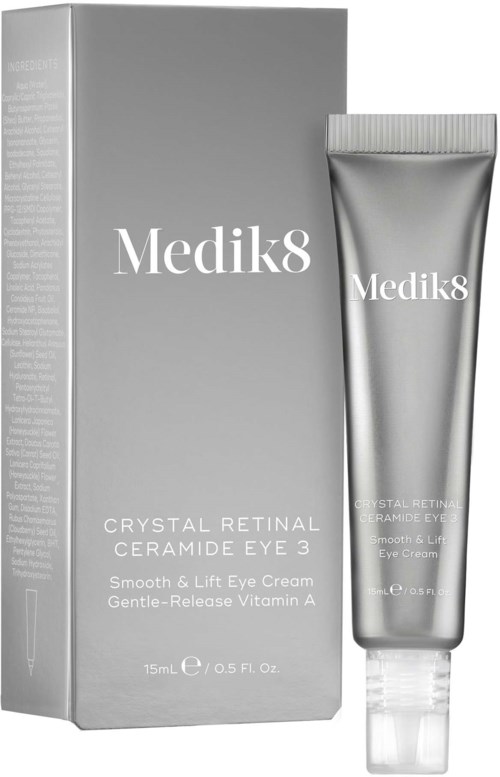 Ein silberner Karton und Tube mit Medik8 Augencreme, beschriftet 'Crystal Retinal Ceramide Eye 3'.
