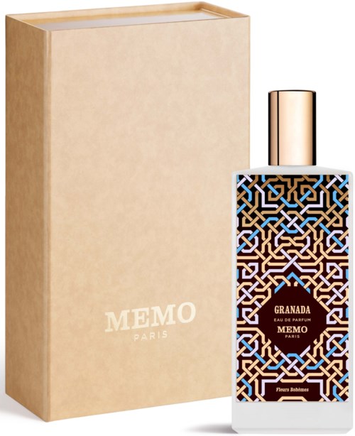 A perfume bottle with a patterned design, gold cap, and a beige box with "MEMO PARIS" written on it.