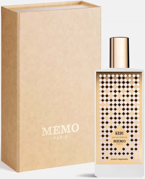 En beige box med en parfymflaska som heter "MEMO PARIS" bredvid.