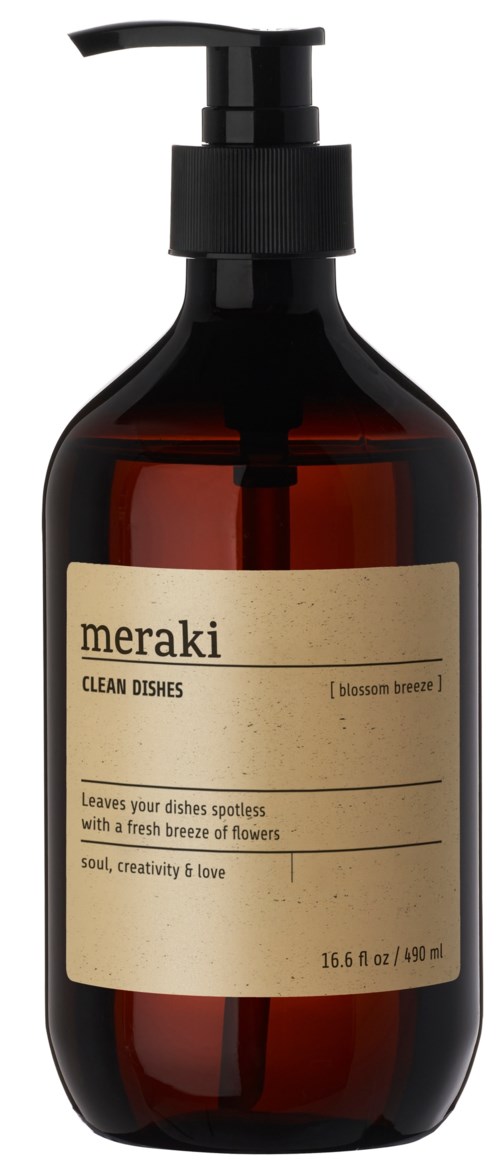 Bärnstensfärgad flaska med svart pump innehåller Meraki diskmedel kallat Blossom Breeze.