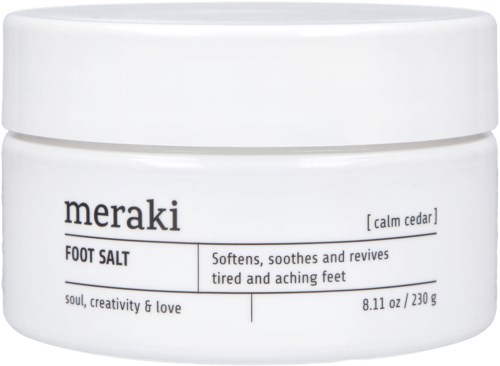 En vit burk märkta Meraki Foot Salt för att lugna och återuppliva trötta fötter.