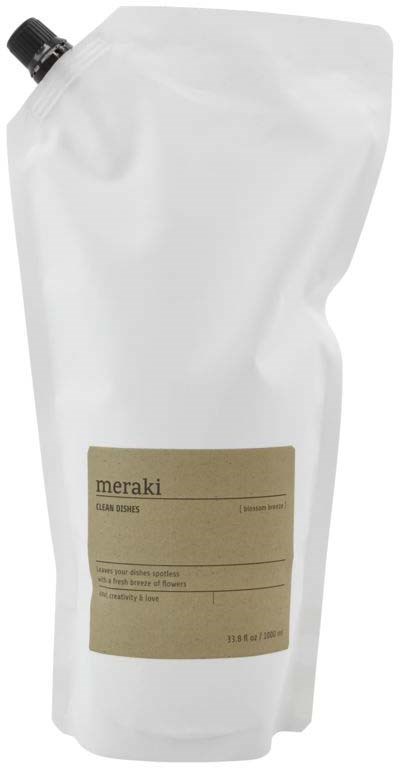En påfyllingspose med svart lokk, merket "meraki" og inneholder flytende såpe eller lotion.
