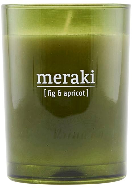 Ett grönt ljus med etiketten 'meraki fig & apricot' i ett glasbehållare.