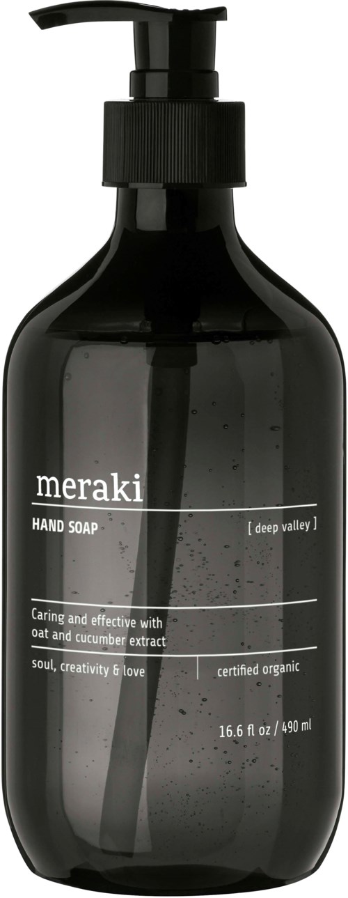 Svart såpepumpeflaske merket 'meraki hand soap' med informasjon om ingredienser og sertifisering.