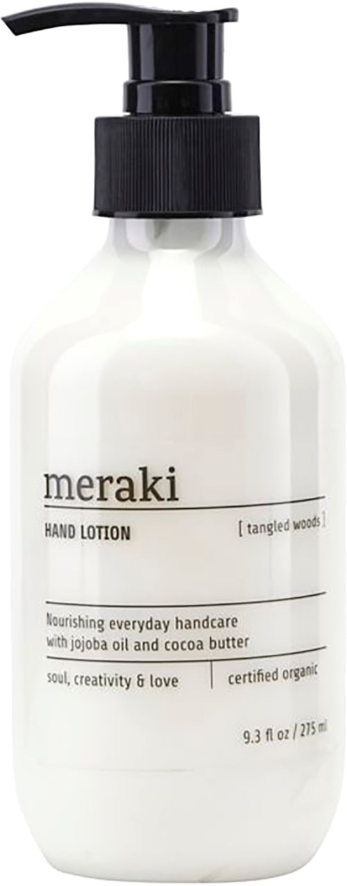 En vit flaska med svart pump, märkt 'meraki hand lotion' med information om ingredienser och ekologisk certifiering.