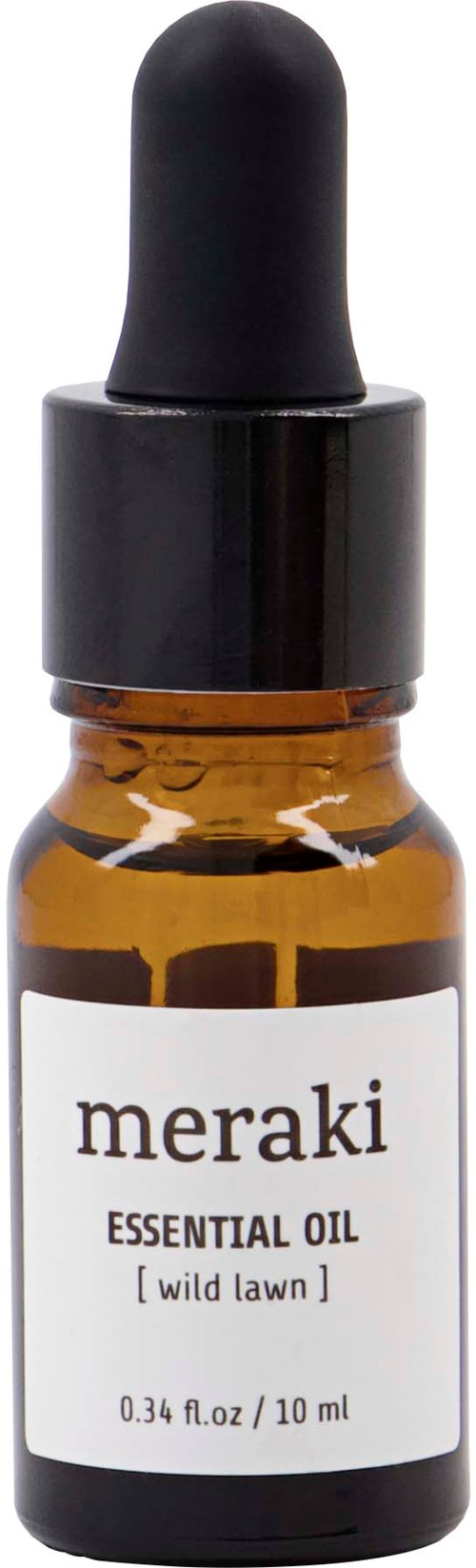 Pieni ruskea pullo mustalla tiputusuppelilla, etiketti sanoo 'meraki essential oil wild lawn', 10 ml.