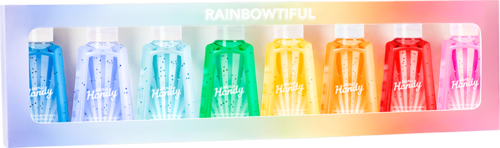 Sex små flaskor i olika färger, arrangerade från blå till rosa, med regnbågsfärger ovanför. Etiketten säger "Rainbowful."