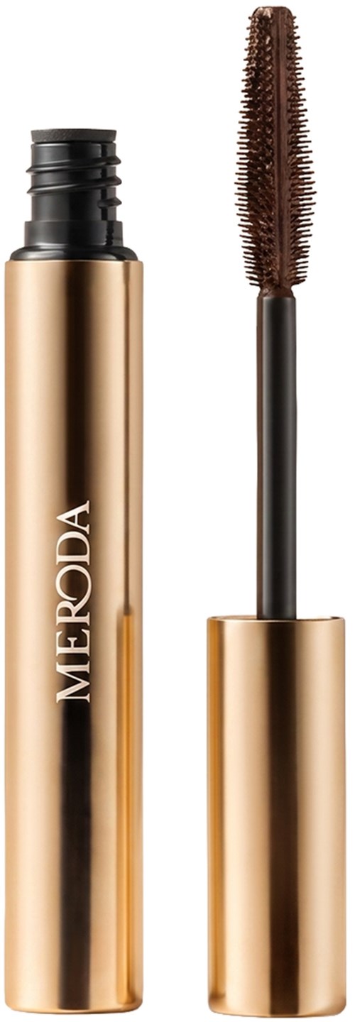 A mascara in a gold tube with the wand removed, showing the curved brush and product inside.