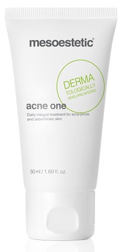 A white tube with the brand name 'mesoestetic' and green circles, labeled for acne treatment, 50ml.