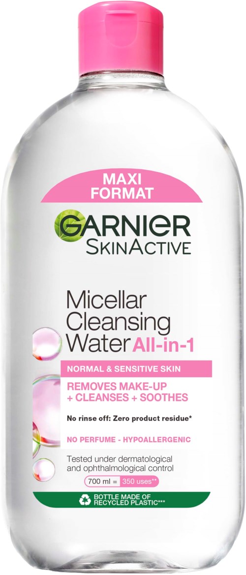 En klart flaska med rosa lock, märkt som Garnier Micellar Rengöringsvatten för normal och känslig hud.