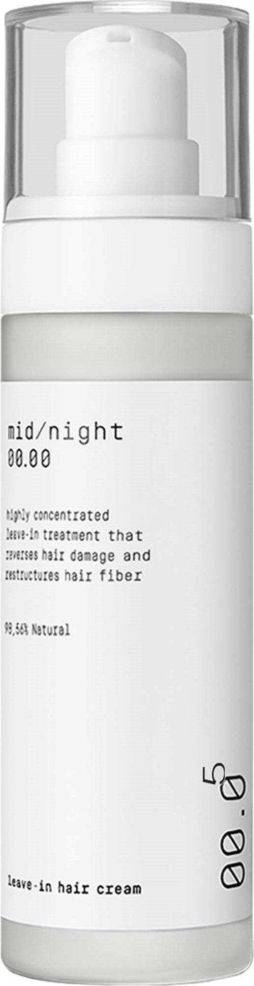 En hvit flaske med pumpe, merket 'leave-in hair cream' og 'mid/night'.