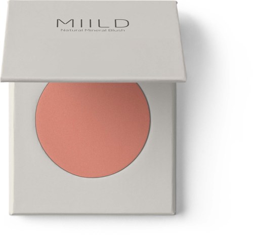 En rund rosa-nejlič blush i en vit box med texten "MILD Natural Mineral Blush."