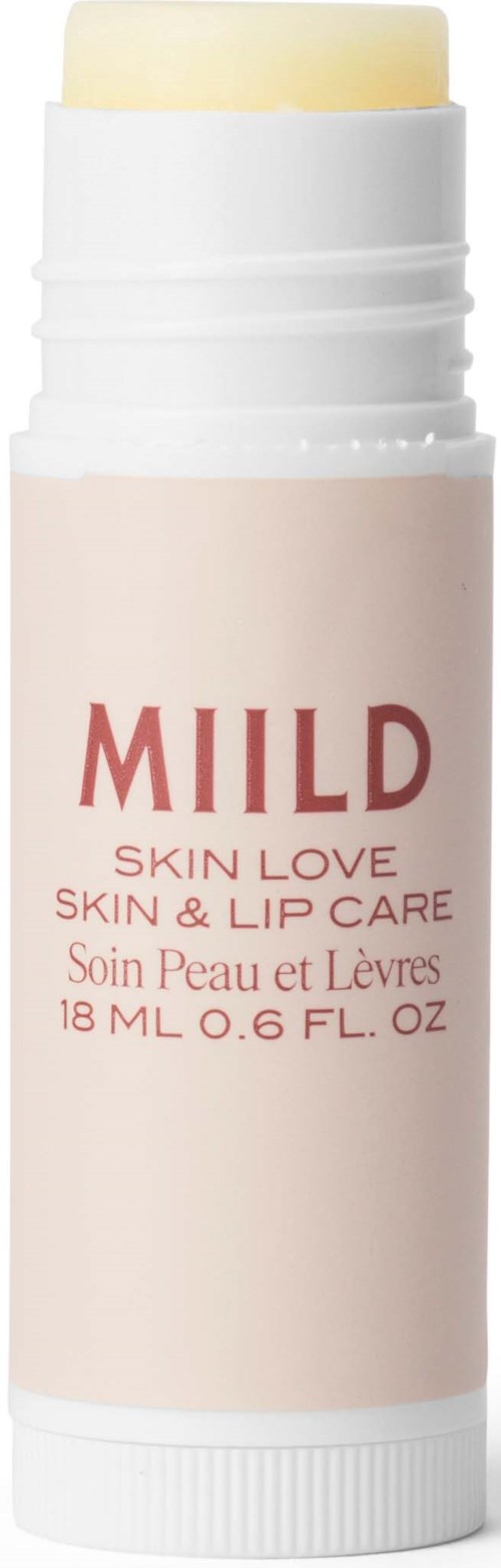 Ett läppbalsam med etiketten 'MILD' för hud- och läppvård, innehåller 18 ml, med beige förpackning och vit lock.