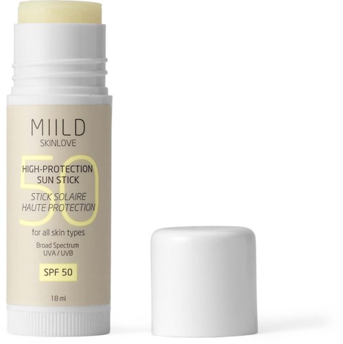 A tube of sunscreen with SPF 50, labeled 'MILD SKINLOVE' and a white cap.