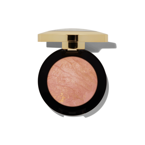 Et rundt makeupprodukt med sort og guldæske, indeholder rosa blush med marmorering.