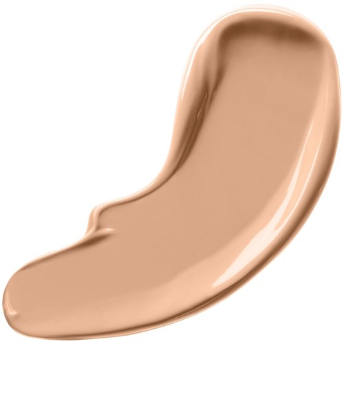 En beige, buet makeup concealer eller foundation i en elegant, glänsende beholder.