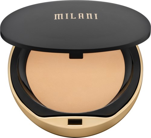 A compact makeup product with powder inside, labeled "Milani," in a round black and gold case.