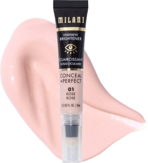 En tube med Milani under-øyenskyggebalanserende concealér på en rosa flekk.